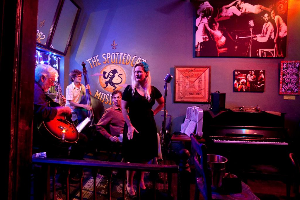 Musicians prepare to perform at a music venue in New Orleans, LA